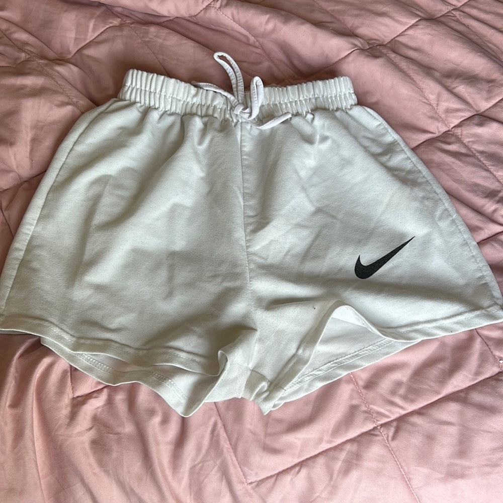 white athletic shorts with adjustable strings